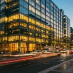 Modern office building at twilight symbolizing corporate energy consumption